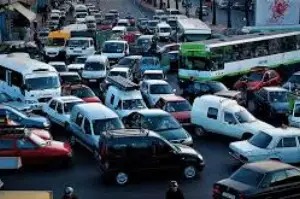 Busy roundabout in Casablanca Morocco with cars and taxis navigating chaotic traffic