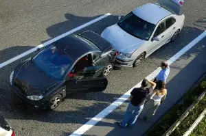 Minor car accident scene in Morocco showing importance of insurance documentation
